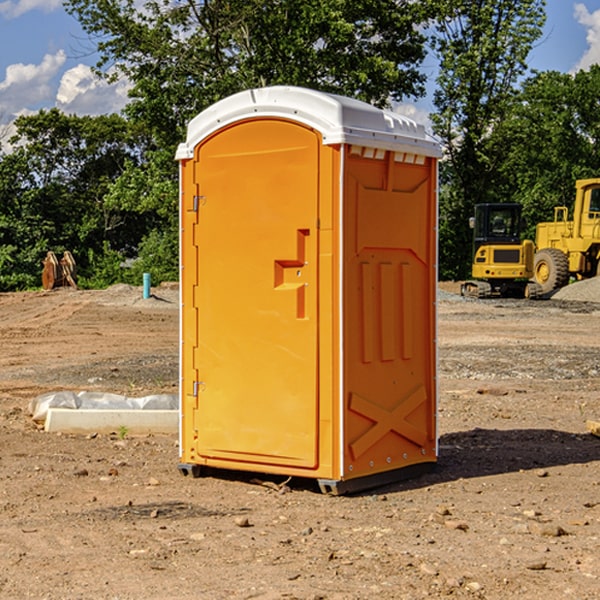 how often are the porta potties cleaned and serviced during a rental period in Sandy